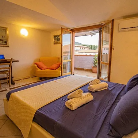Attico Con Sauna E Piscina A Apartman Porto Azzurro
